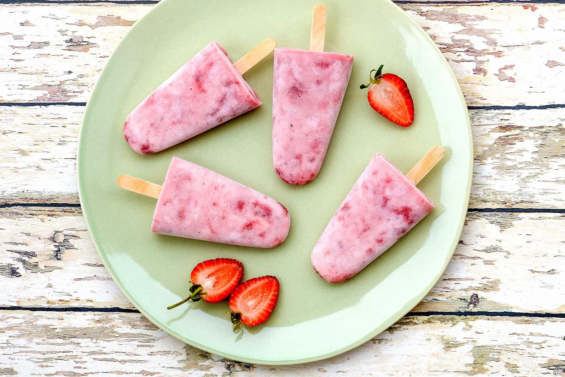 Strawberry yogurt popsicles.