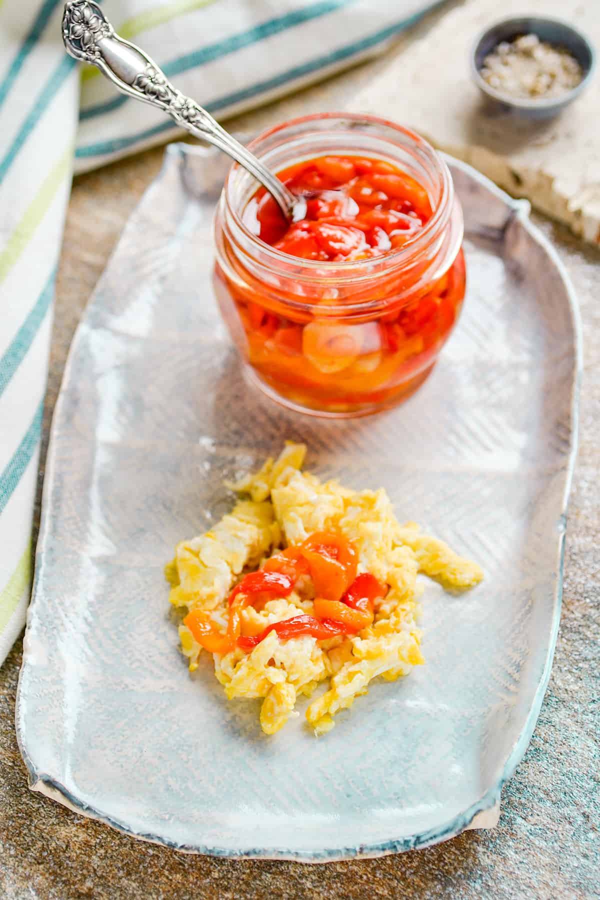 Roasted sweet peppers on scrambled eggs.