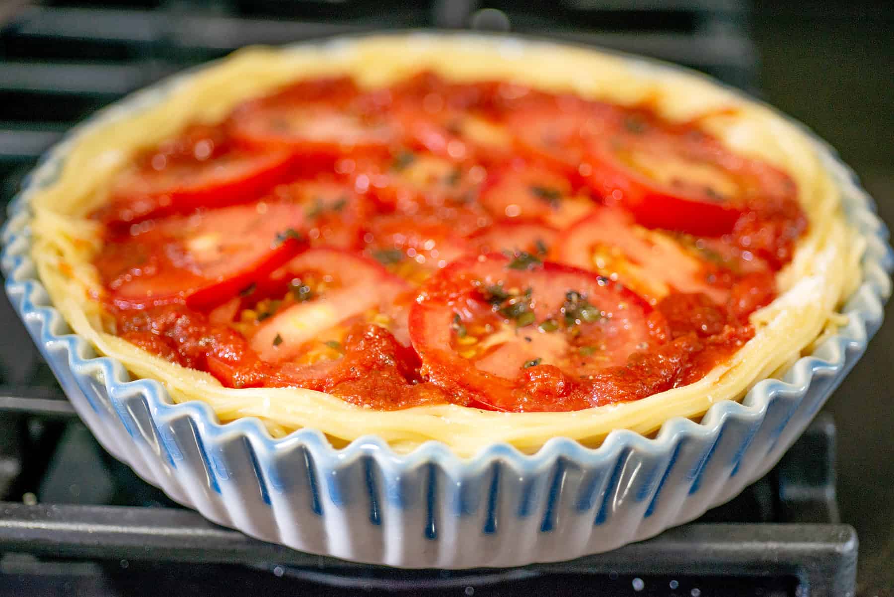 Layer or seasoned tomatoes and tomato sauce.