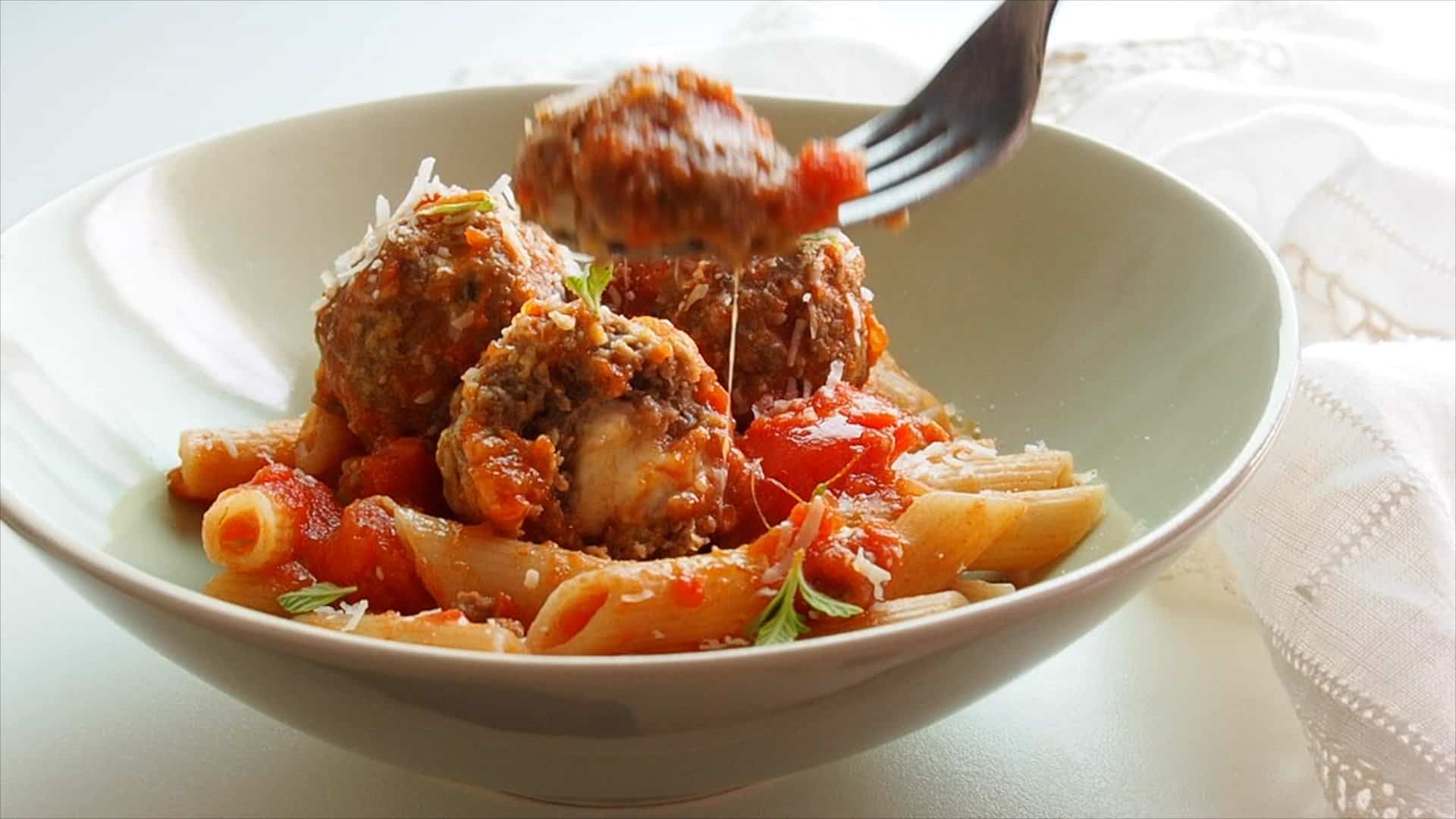 Mozzarella meatballs with pasta.