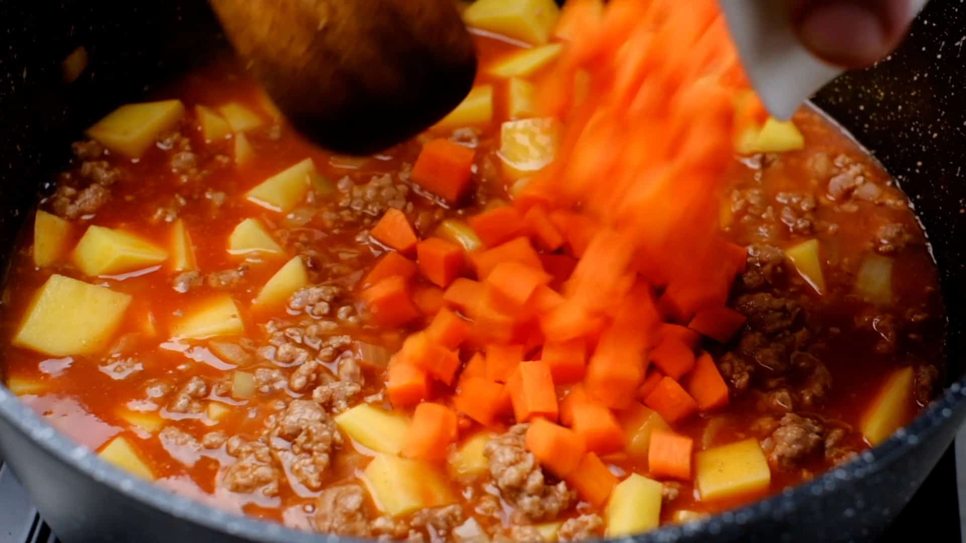 Cooking potato and carrot.