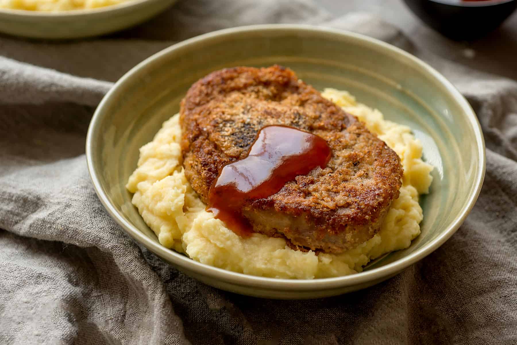 Turkey chops with mashed potatoes.