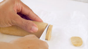 Cutting the cookies.