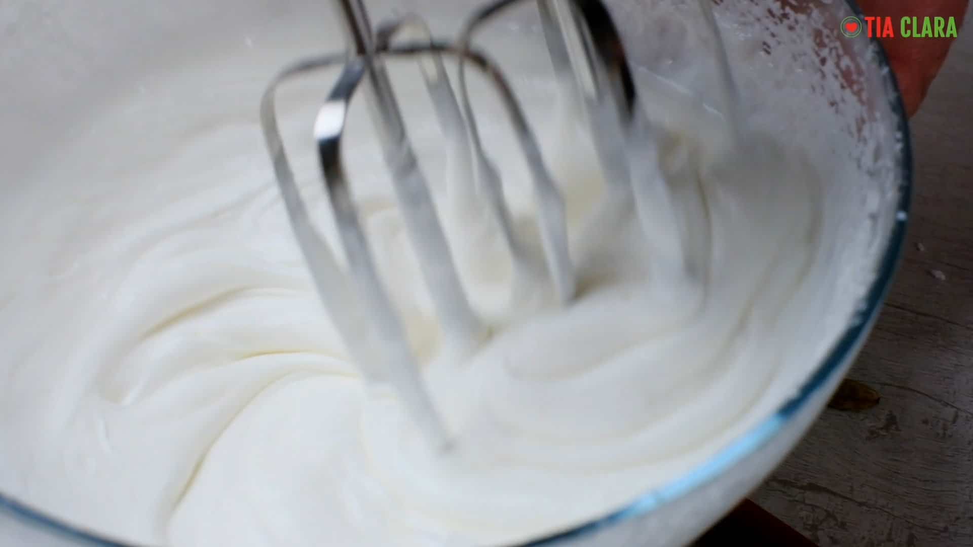 Whipping the cream.