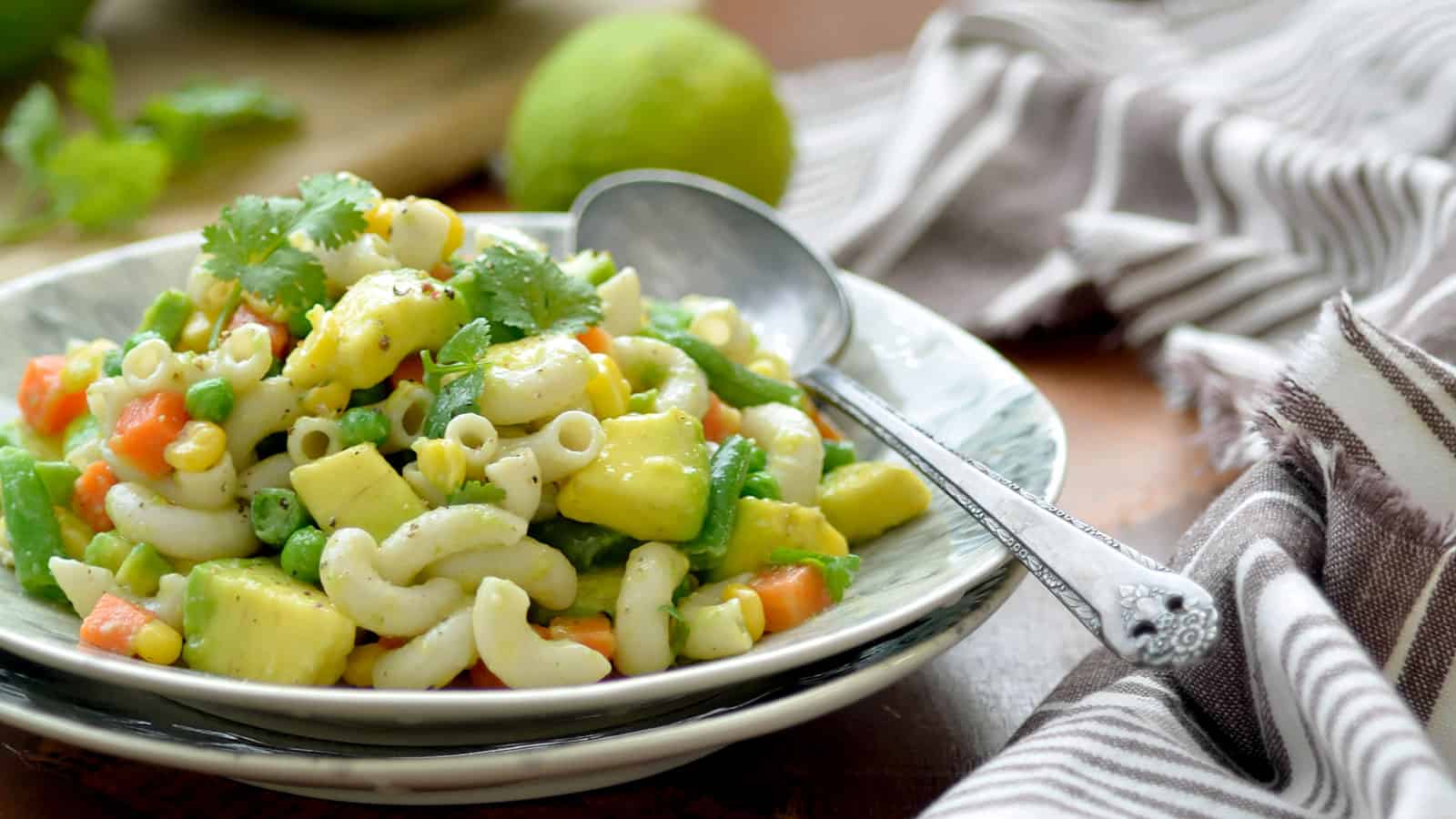 Vegan pasta salad with avocado.