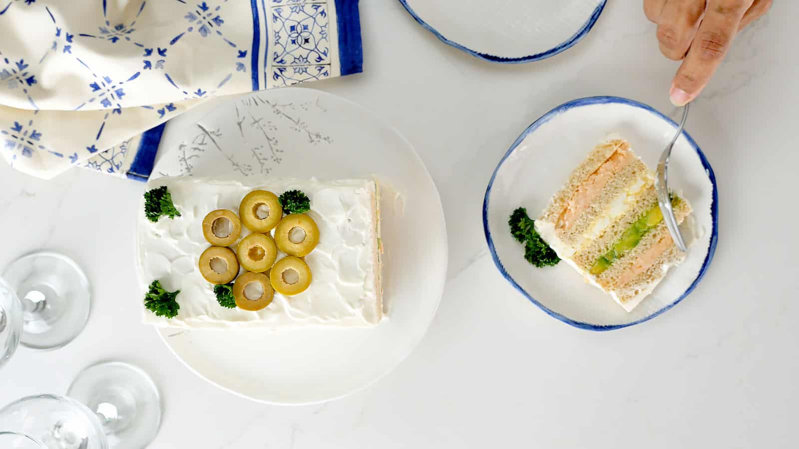 Shrimp and avocado sandwich cake.