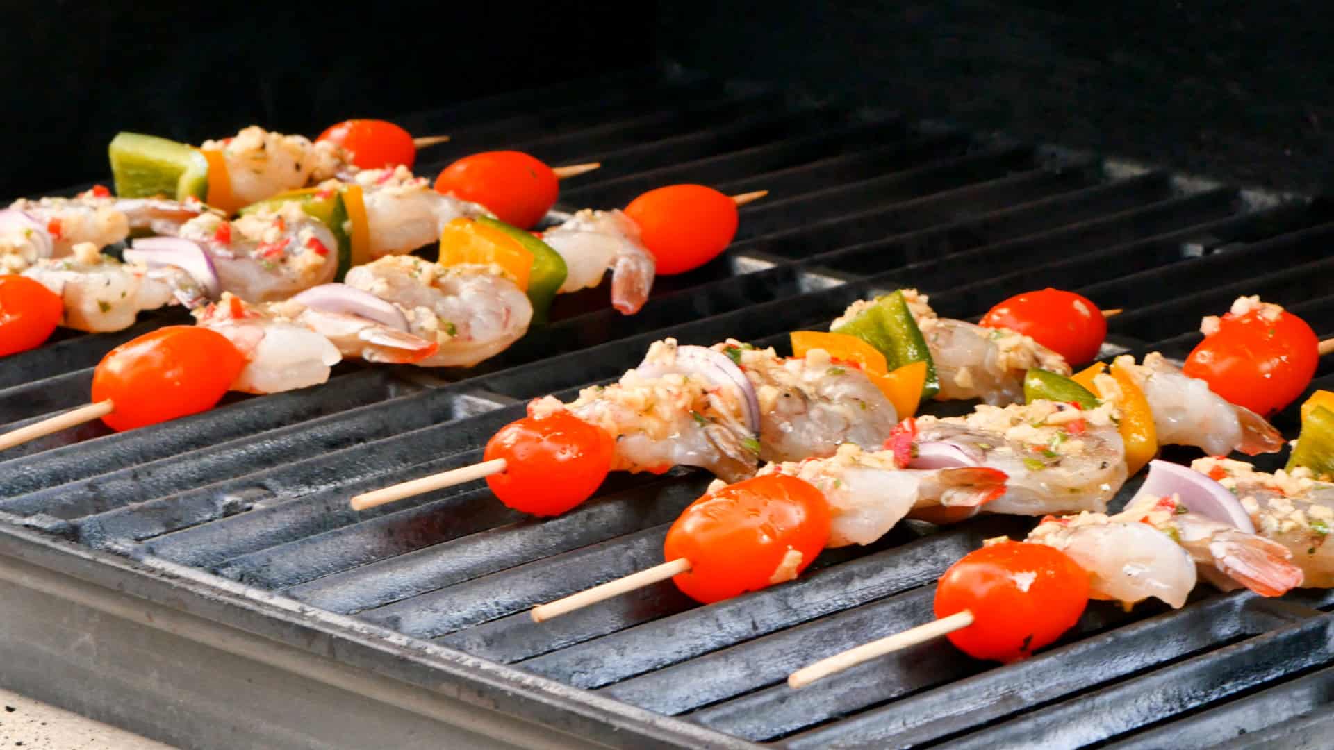 Grilling brochettes.