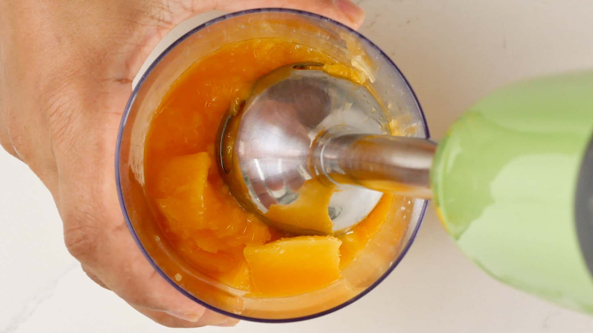 Making the mango juice.