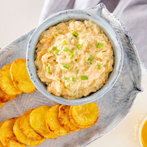 Chicken cream cheese dip with chips.