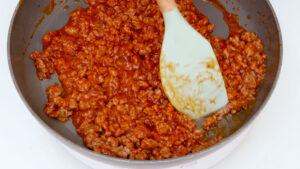Cooking meat.