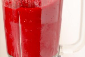 Blending beets and carrots for beet carrot juice.